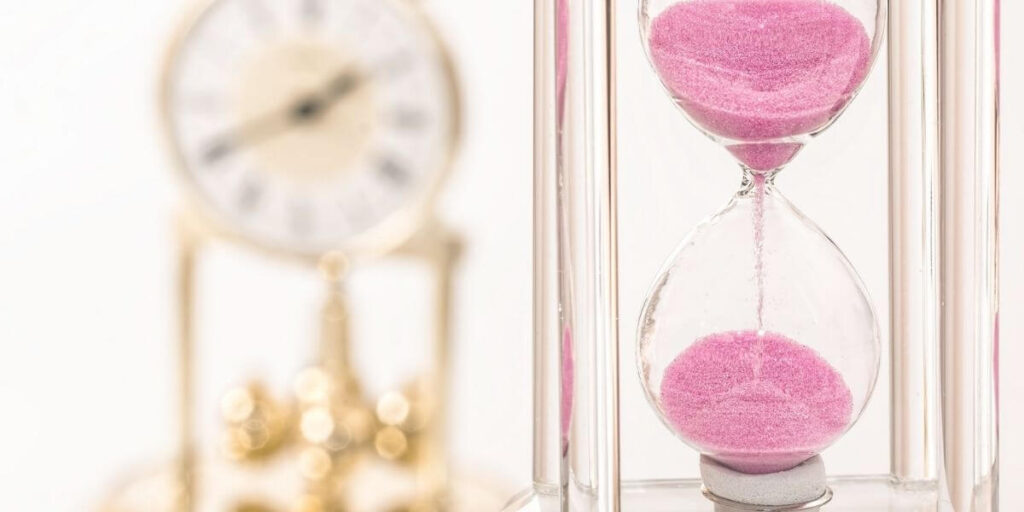 pink sand timer and clock