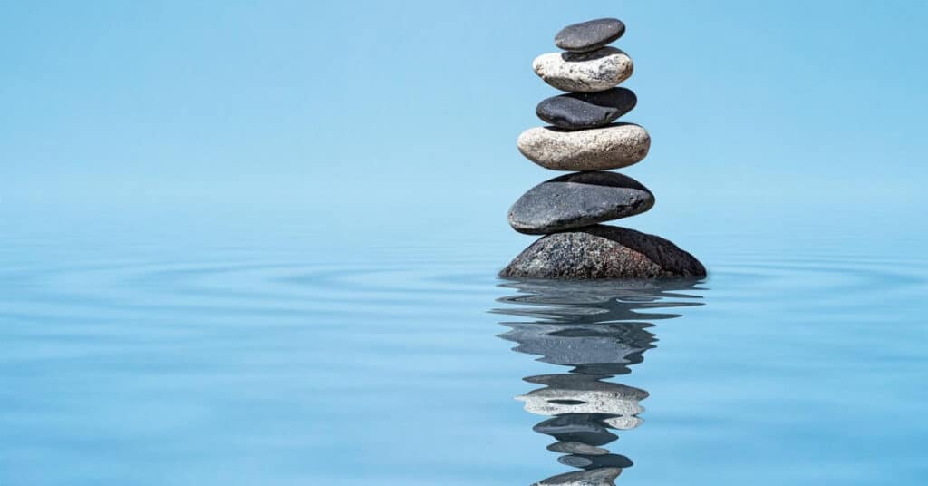 Zen balanced stones stack in water