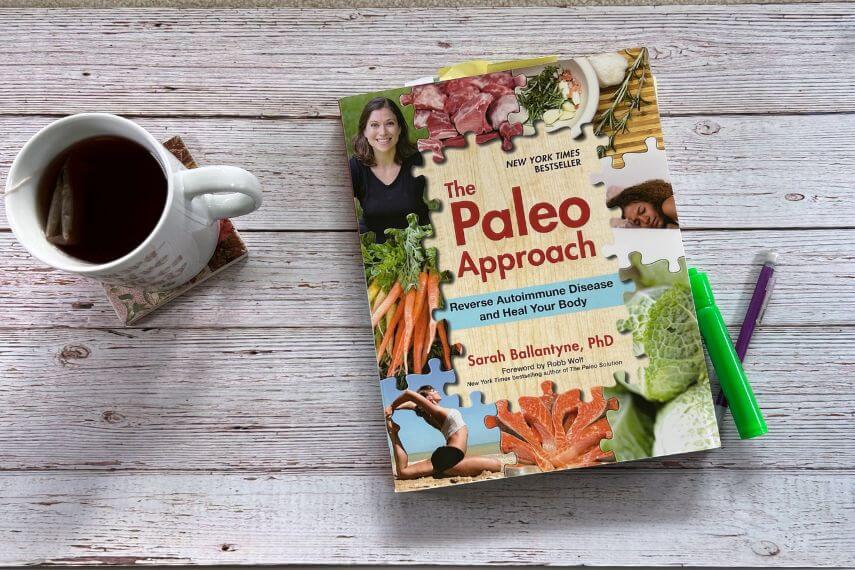 The Paleo Approach book and cup of tea