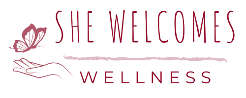 A logo reading "She Welcomes Wellness" features a stylized hand with a butterfly, symbolizing healing and serenity. The tone is calming and inviting.